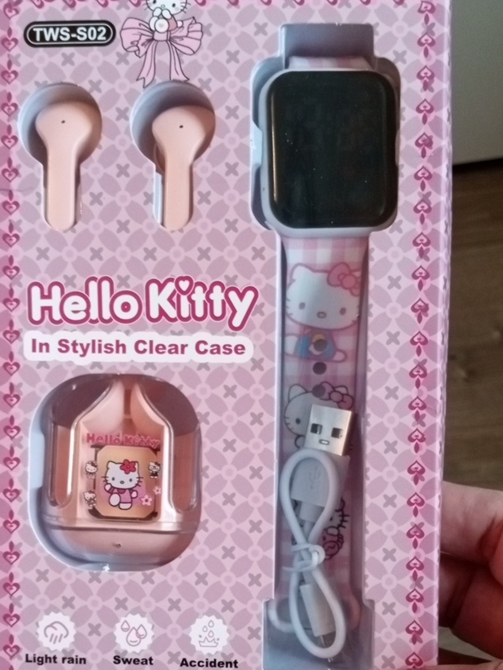 Hello Kitty Pink Earbuds, Charging Case & Matching Smartwatch Strap - Picture 4 of 4